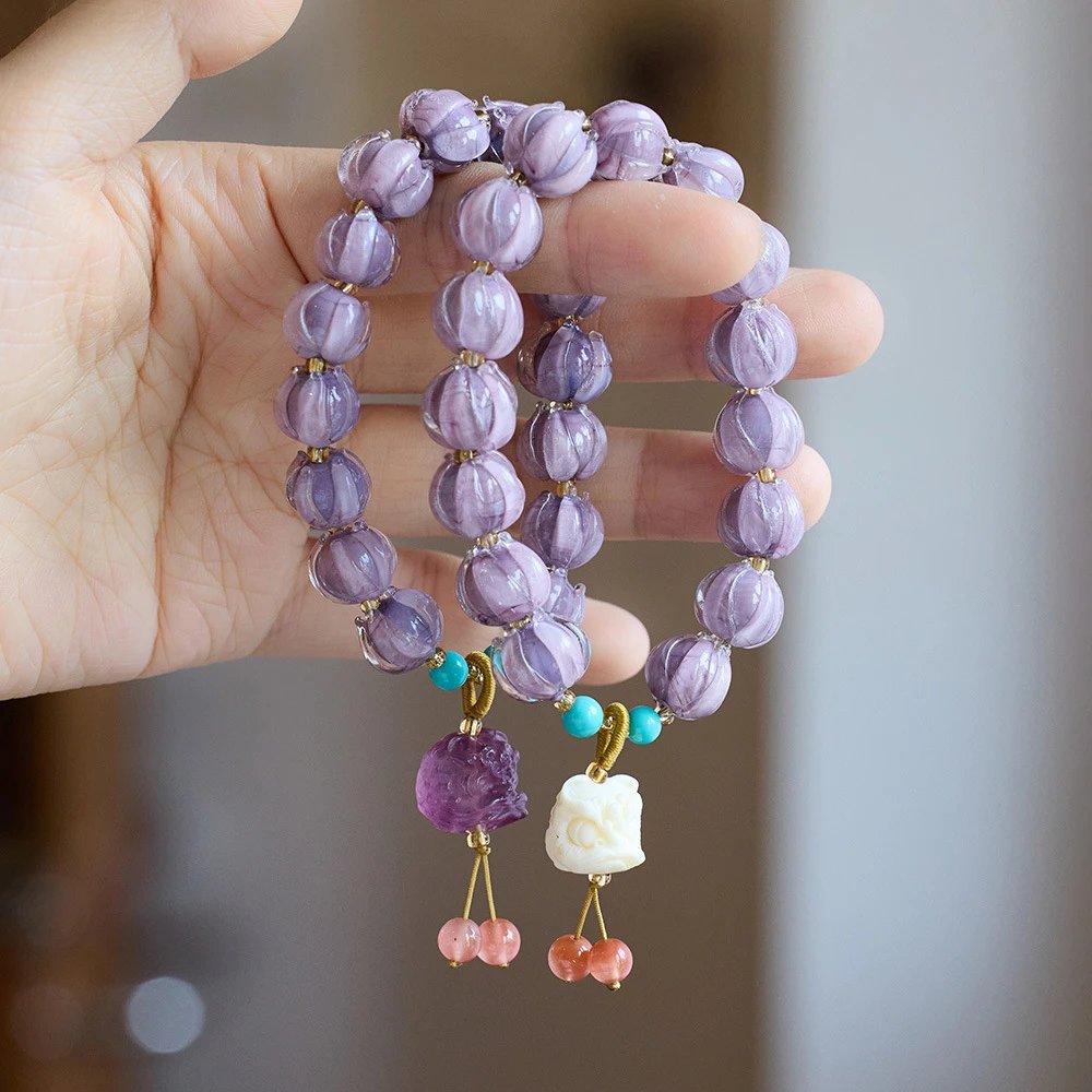 Purple Glass Lotus · Fluorite & Tagua Nut Imitation Guardian Lion Bracelet