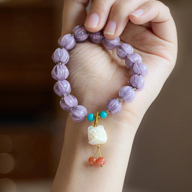 Purple Glass Lotus · Fluorite & Tagua Nut Imitation Guardian Lion Bracelet