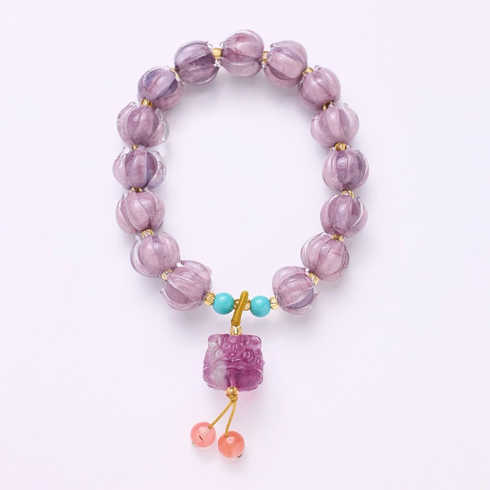Purple Glass Lotus · Fluorite & Tagua Nut Imitation Guardian Lion Bracelet