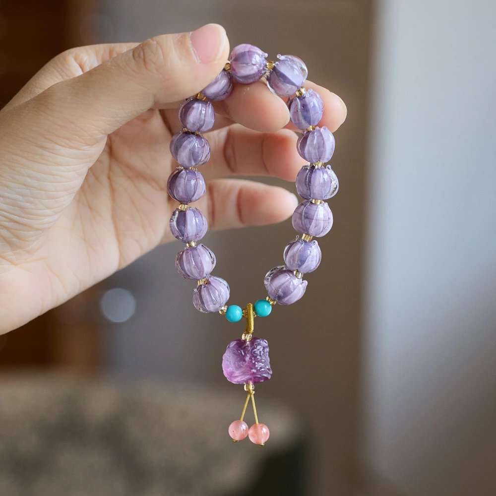 Purple Glass Lotus · Fluorite & Tagua Nut Imitation Guardian Lion Bracelet