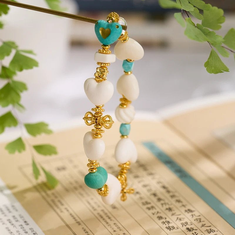 11–14mm Faux Ivory Deer Bone Peach Heart Bracelet | Vajra Pendant