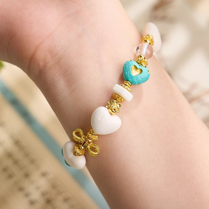 11–14mm Faux Ivory Deer Bone Peach Heart Bracelet | Vajra Pendant
