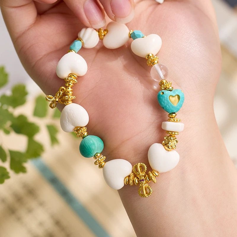 11–14mm Faux Ivory Deer Bone Peach Heart Bracelet | Vajra Pendant